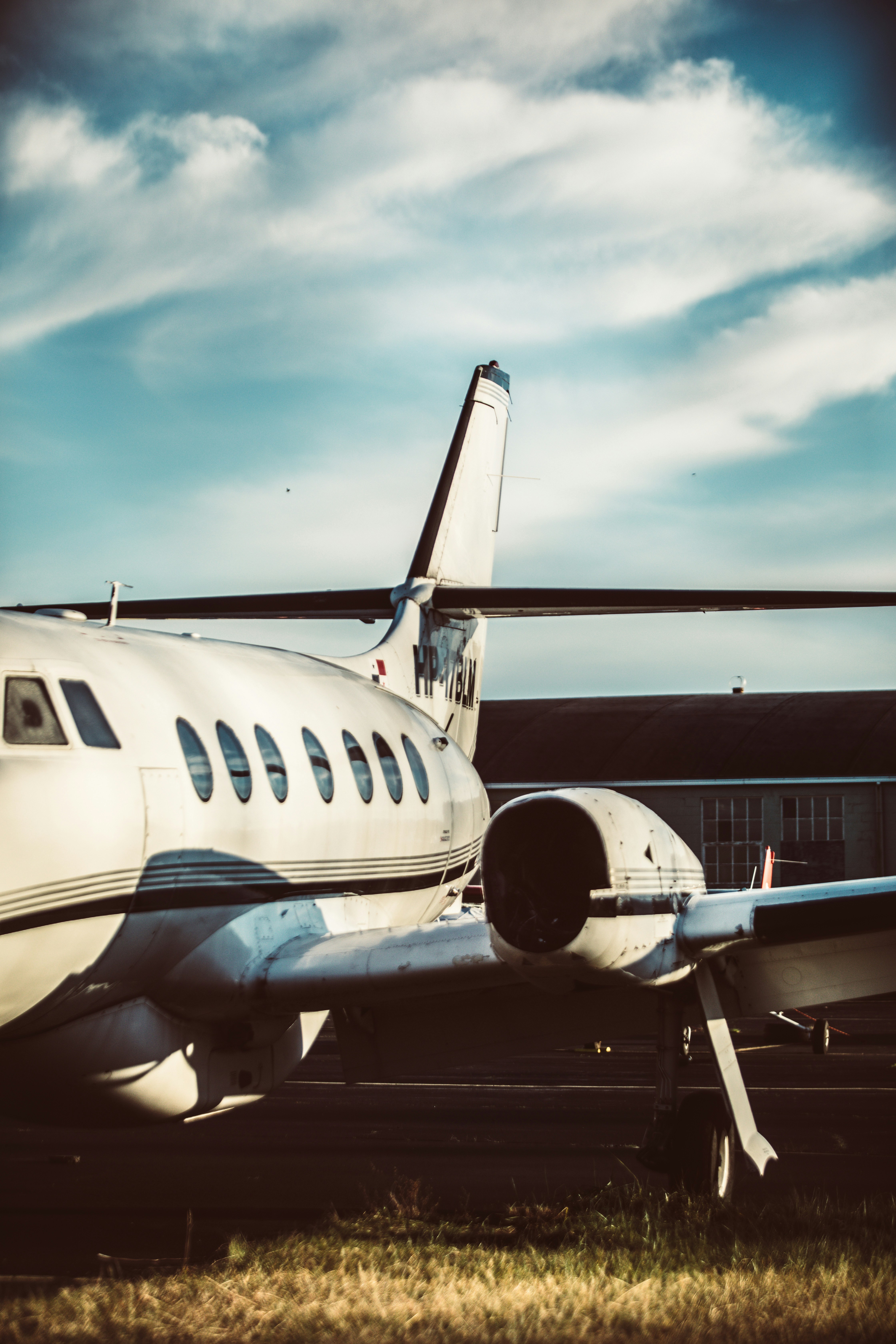 white airplane at airport